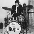 Paul McCartney as the Drummer